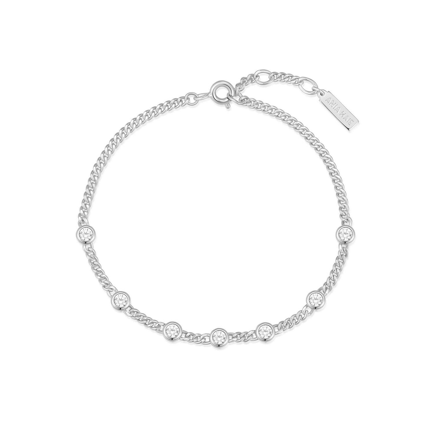 Silver bracelet with small diamonds on a white background