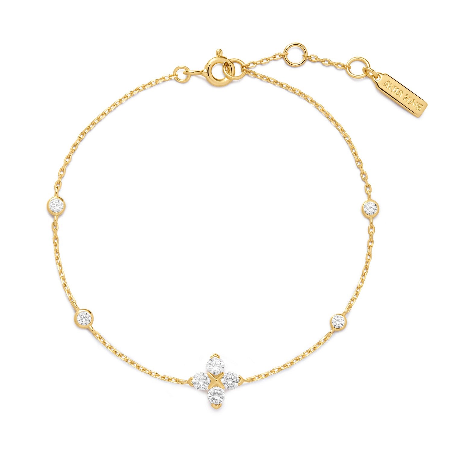 Gold bracelet with star-shaped clasp and diamond accents on a white background