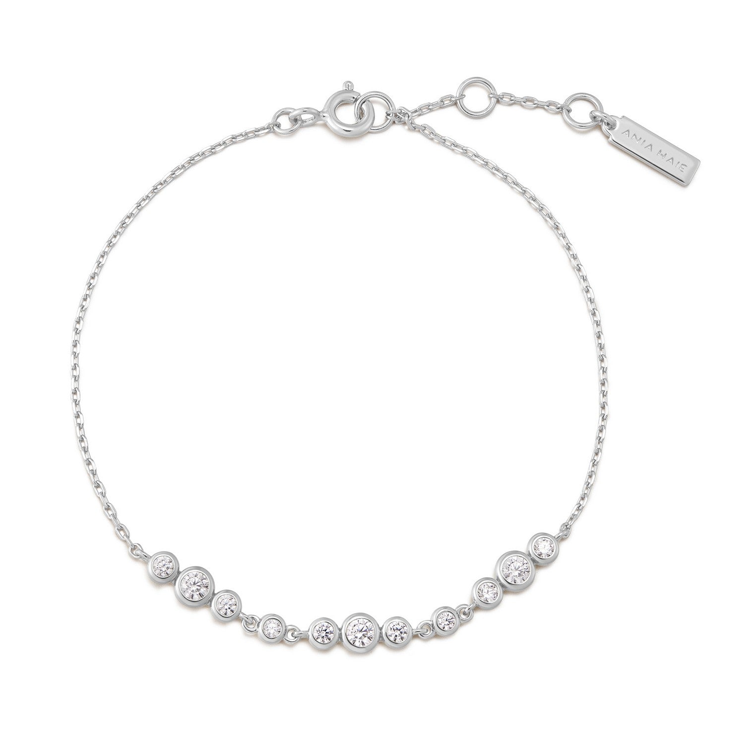 Silver bracelet with clear stones on a white background