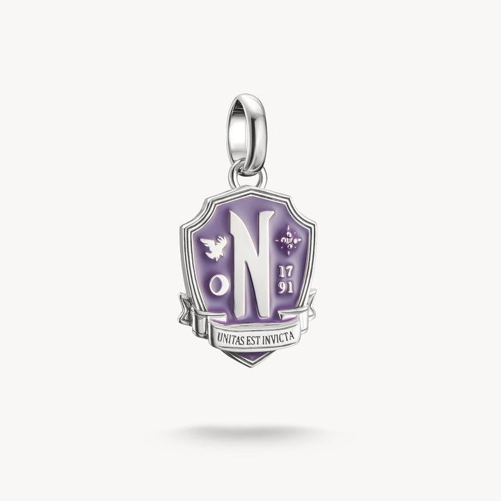Purple and silver pendant with a logo on a white background