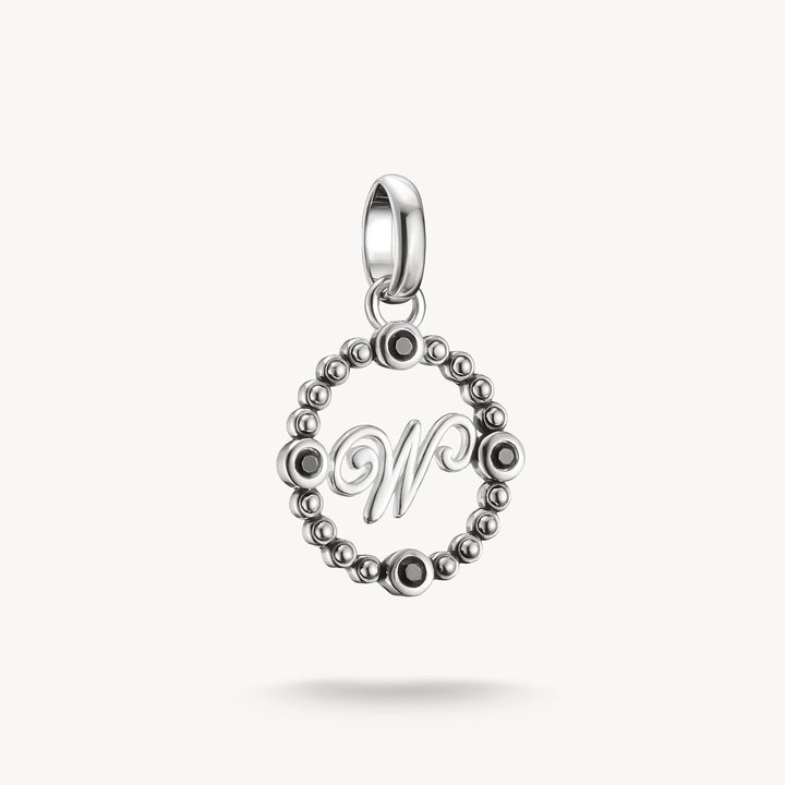 Silver pendant with letter 'W' on a white background