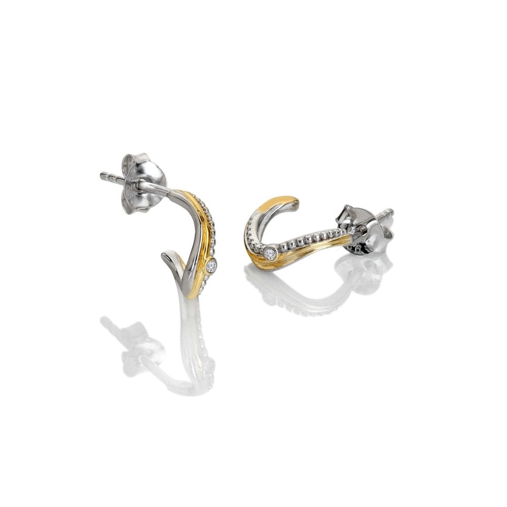 Pair of gold and silver earrings