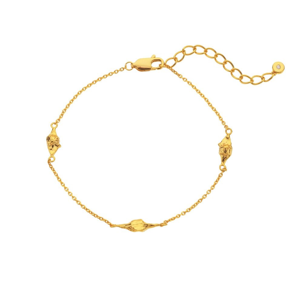 Gold bracelet with decorative elements
