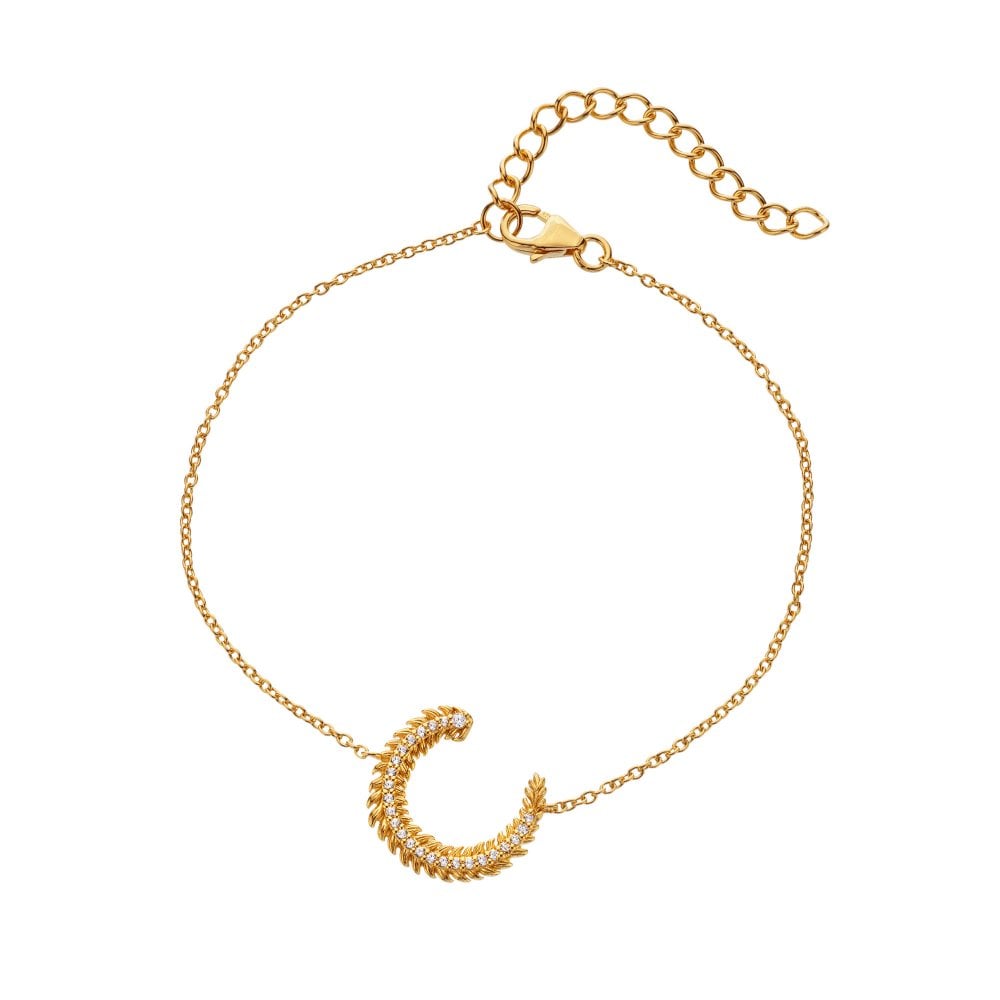 Gold bracelet with a crescent moon charm