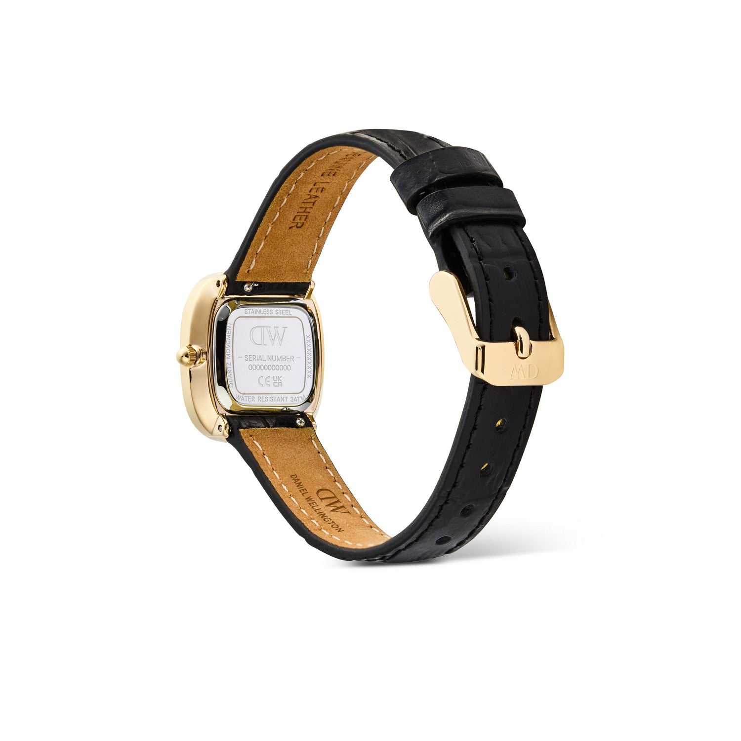 A close-up shot of a watch from the back, showing a black leather strap with gold-toned stitching and a gold-toned case backplate engraved with 'dw'.