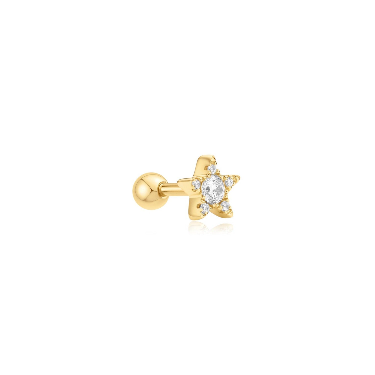 Gold earring with a clear gemstone on a white background