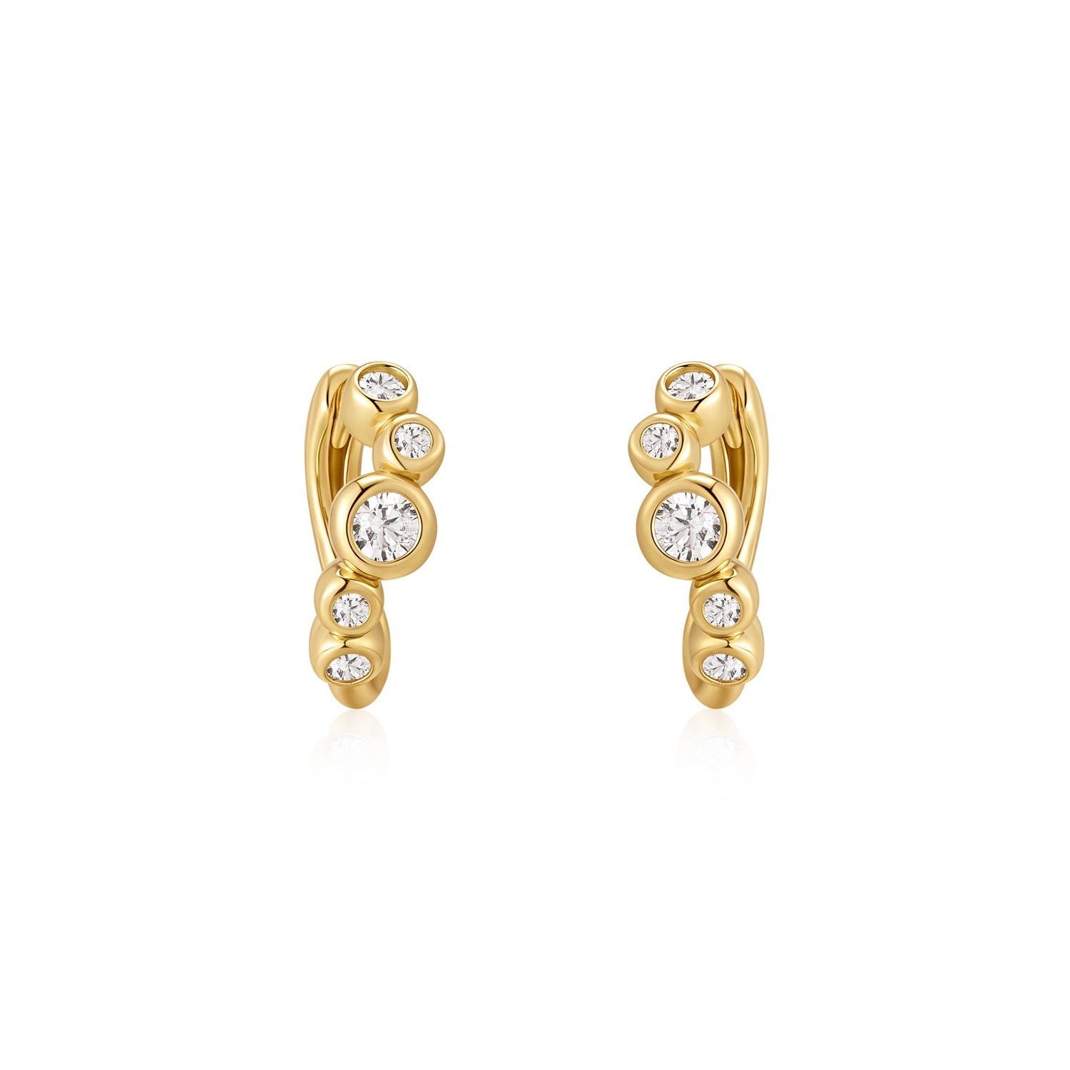 Gold earrings with embedded diamonds on a white background