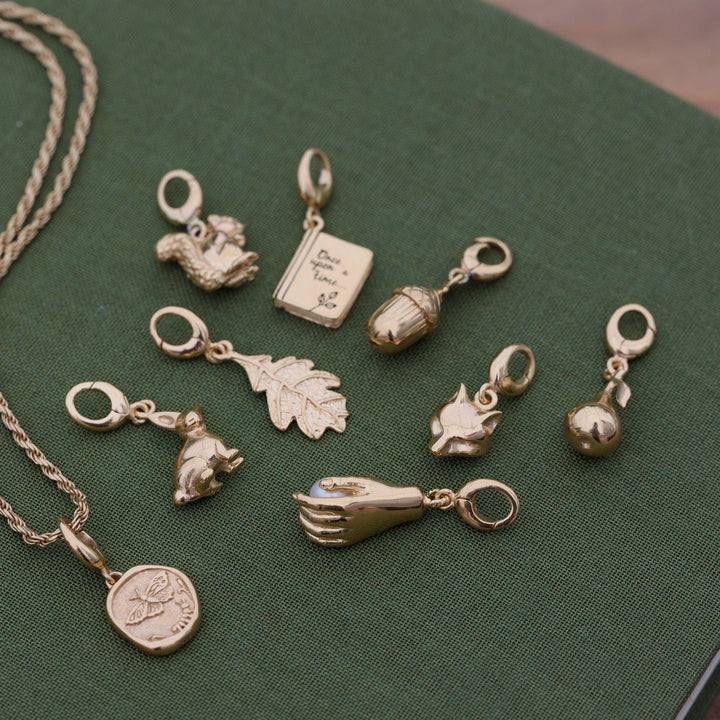 Gold Plated Hand and Pearl Charm CGHPL