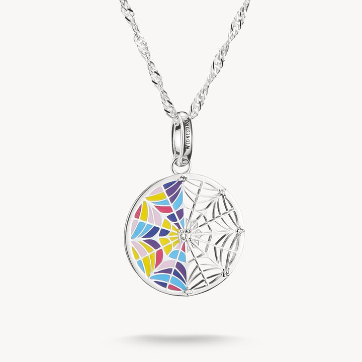 Colorful spider web pendant on a white background