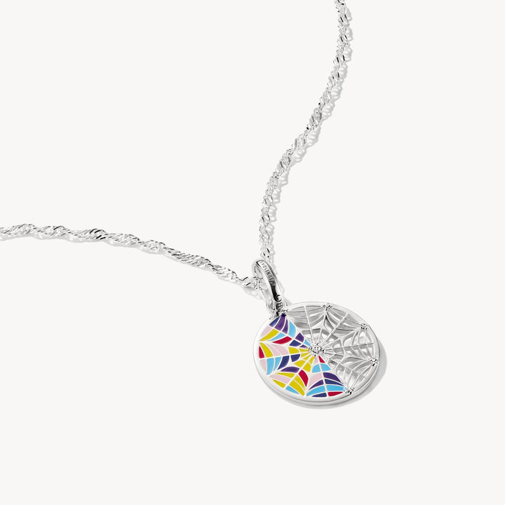 Silver necklace with a colorful pendant on a white background