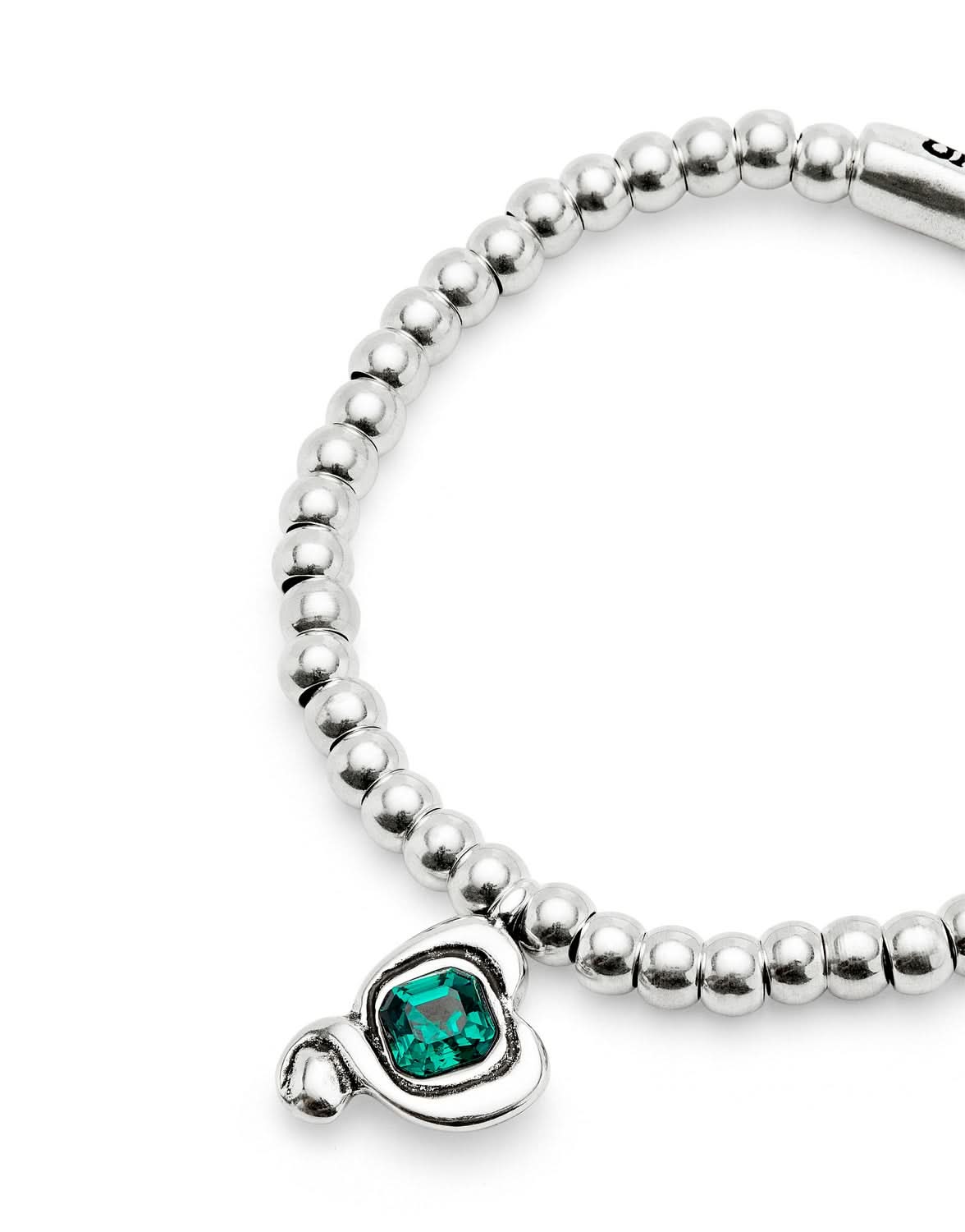 Close-up view of the Sterling Silver Plated Ser Expresiva Green Bracelet PUL2514VRDMTL0, showcasing its intricate craftsmanship and striking green crystal.