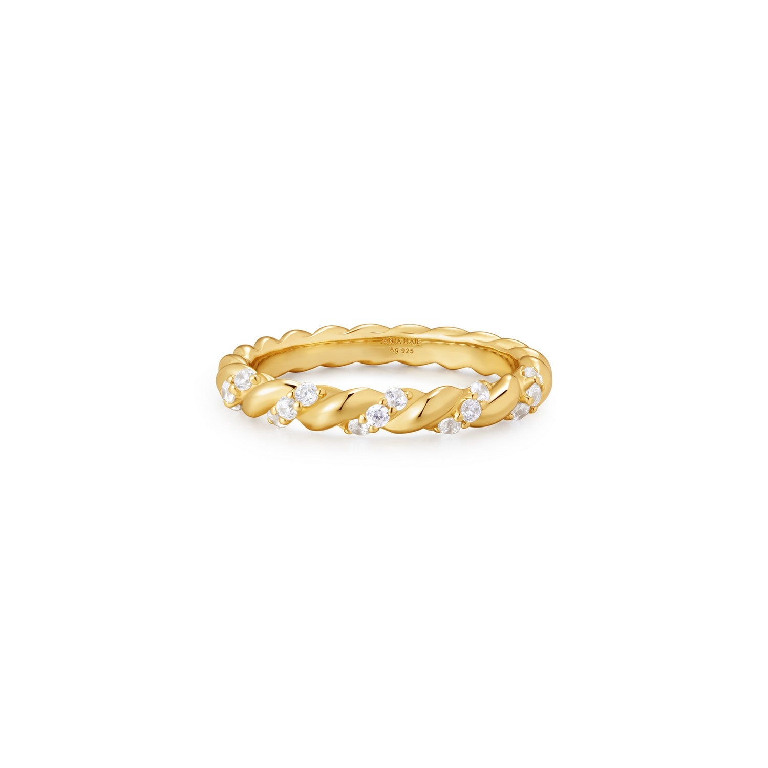 Gold ring with small diamonds on a white background