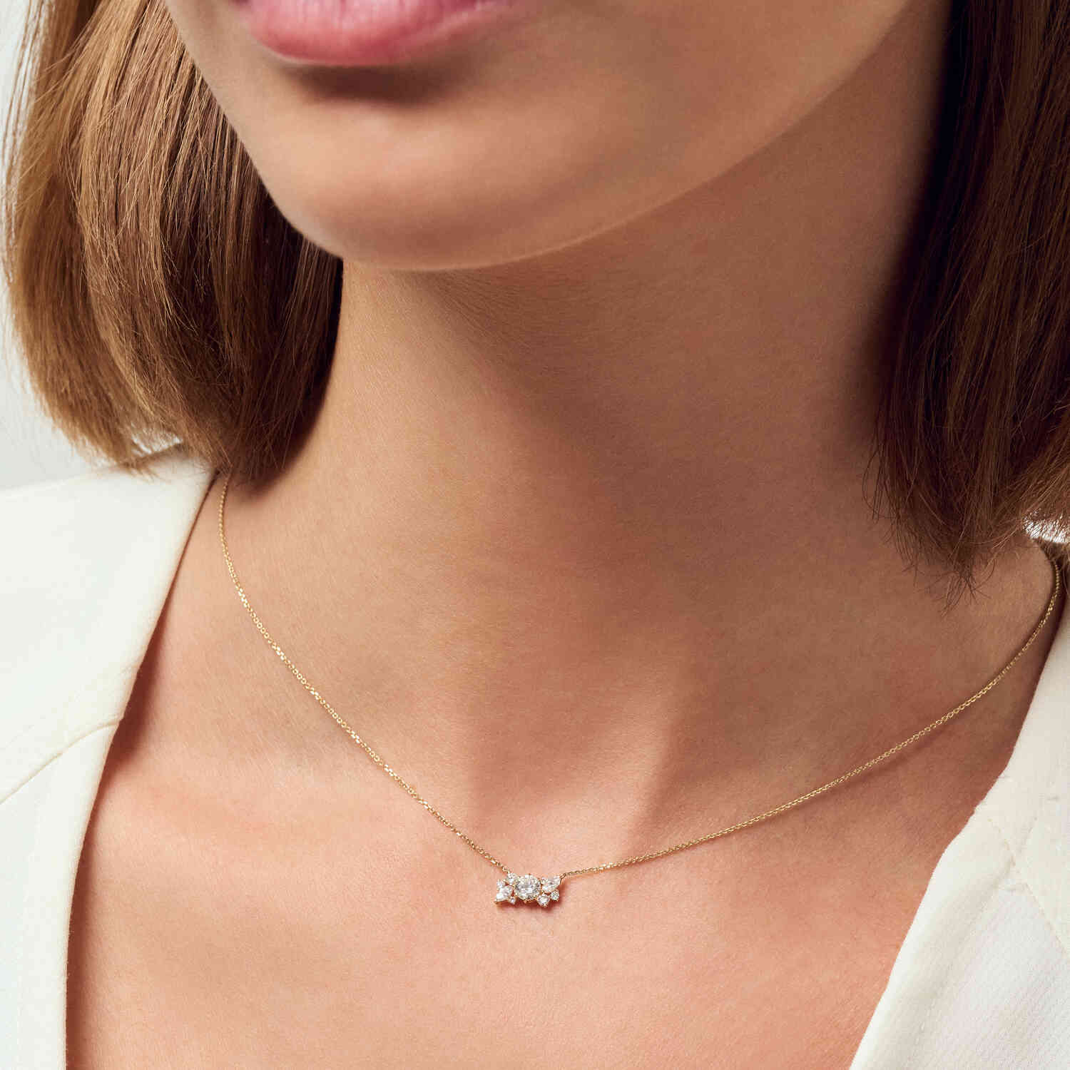 The luxurious 14k Yellow Gold Lovere Diamond Necklace SJ-N2550-WD-YG adorned with 0.57 carats of exquisite lab-grown diamonds.