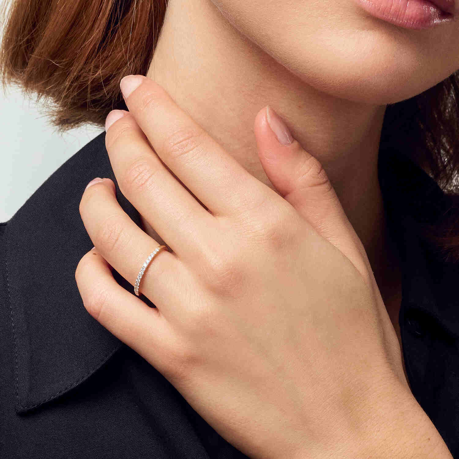Close-up of a woman wearing the 14k White Gold Alba Diamond Ring SJ-R2515-WD-WG, highlighting the shimmering details of this luxurious ring set with lab-grown diamonds.