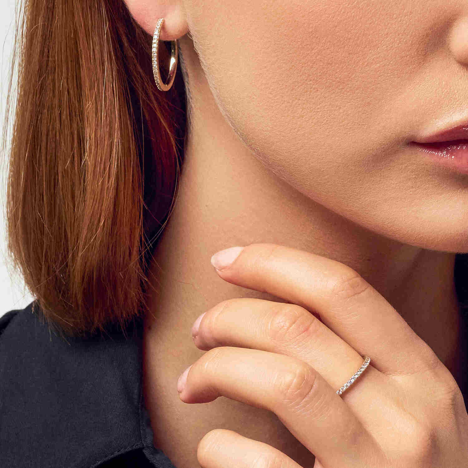Profile view of a woman wearing the 14k Yellow Gold Alba Diamond Ring SJ-R2515-WD-YG alongside elegant earrings, emphasizing the luxurious style.