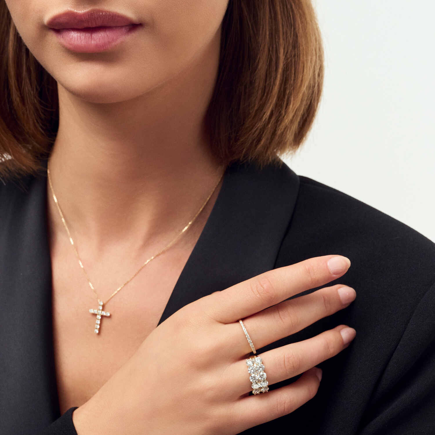 14k White Gold Ariccia Diamond Ring SJ-R2531-WD-WG showcased on a model's hand, emphasizing its luxurious design and brilliance, complemented by a stylish outfit and delicate necklace.