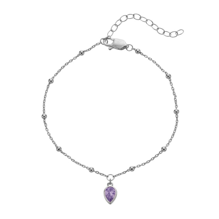 Silver bracelet with a purple teardrop-shaped gemstone