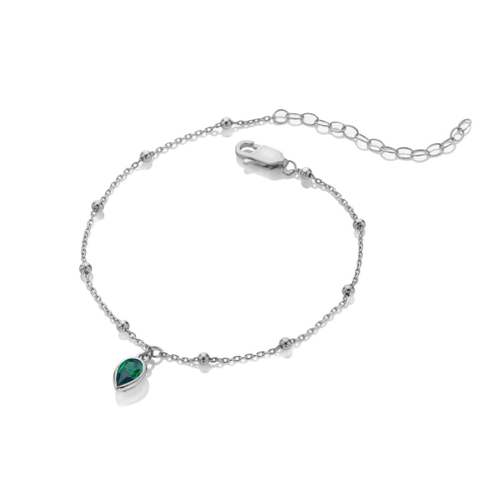 Silver bracelet with a green gemstone