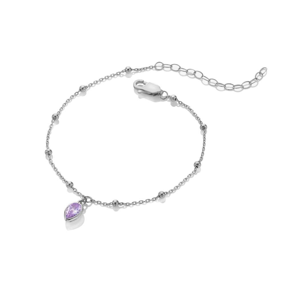 Silver bracelet with a purple heart charm