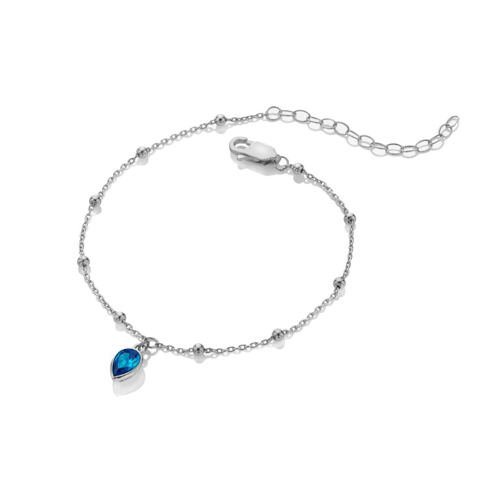 Silver bracelet with a blue heart-shaped gem