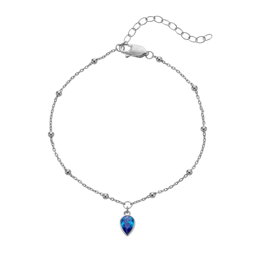 Silver bracelet with a blue teardrop pendant