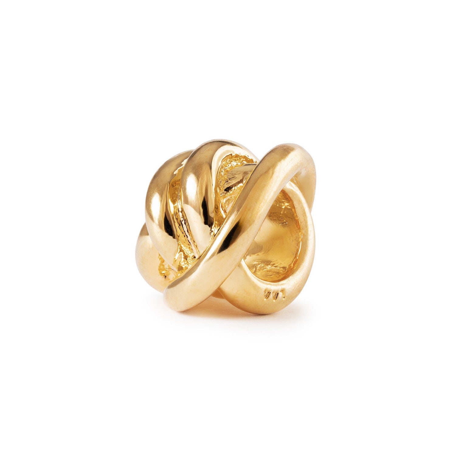 Gold knot-shaped charm on a white background