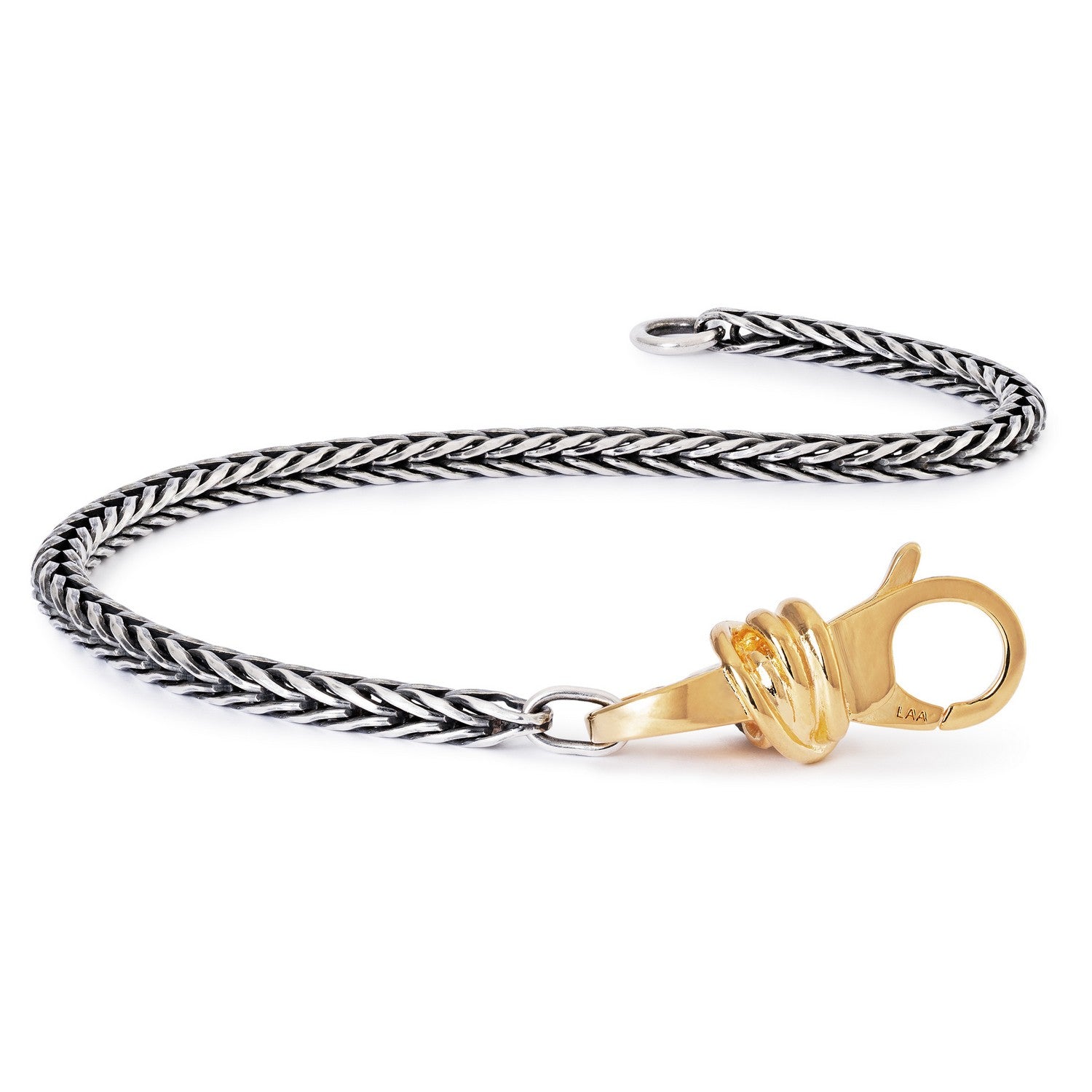 Bracelet with braided design and gold clasp on a white background