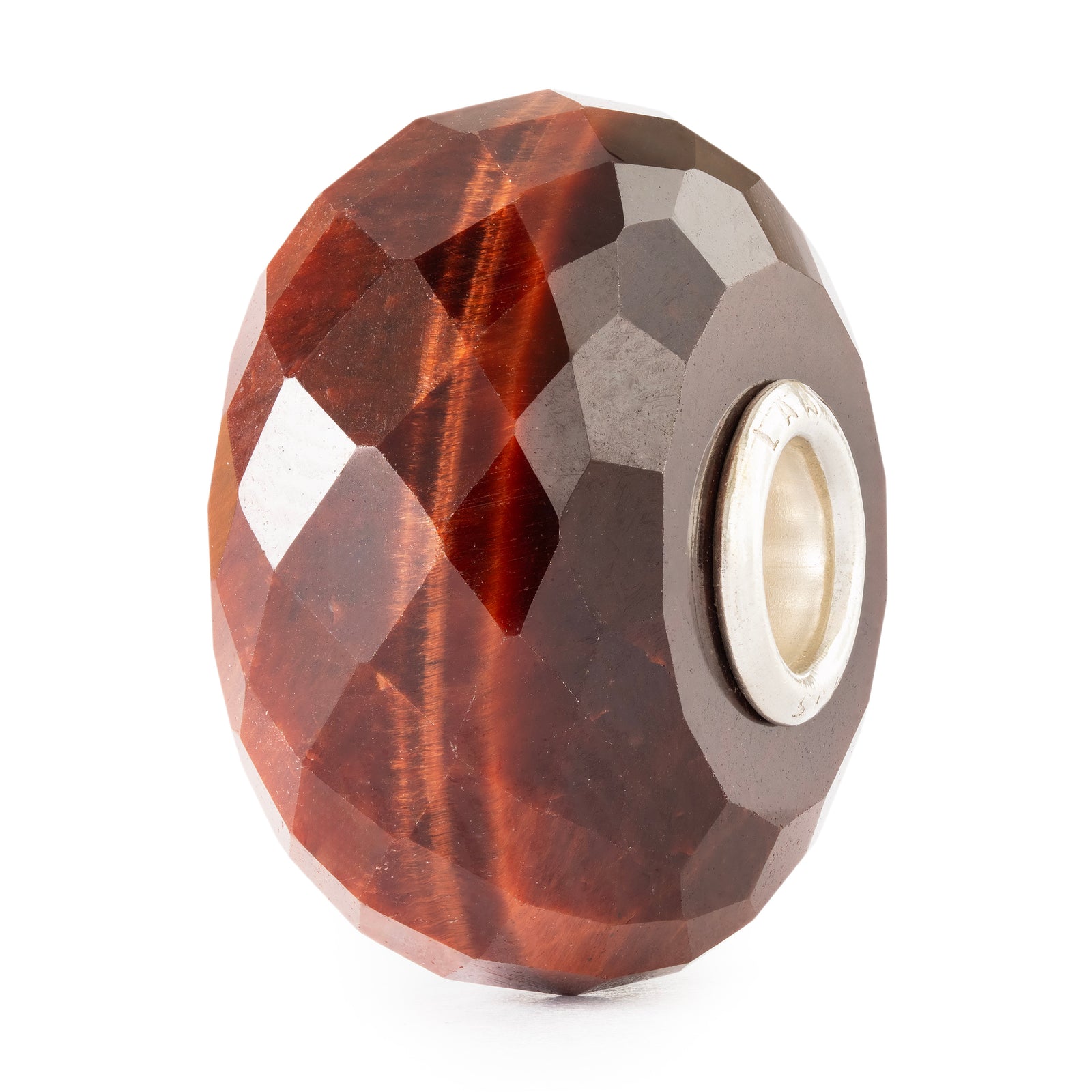 Faceted gemstone bead on a white background