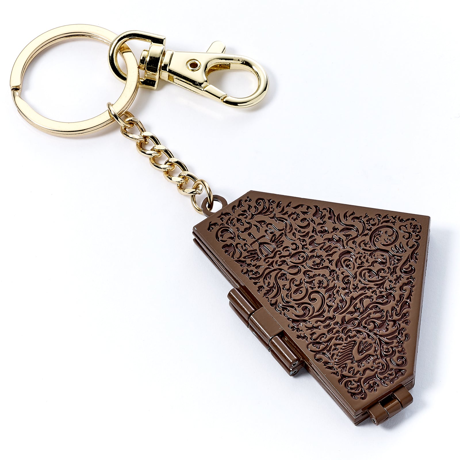 Decorative keychain with intricate design on a white background