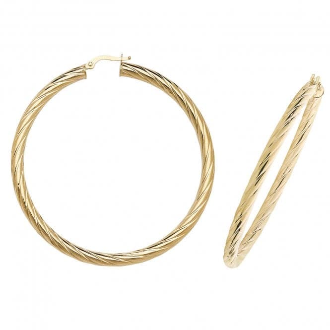 a pair of gold hoop earrings on a white background