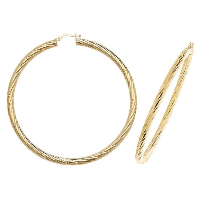 a pair of gold hoop earrings on a white background