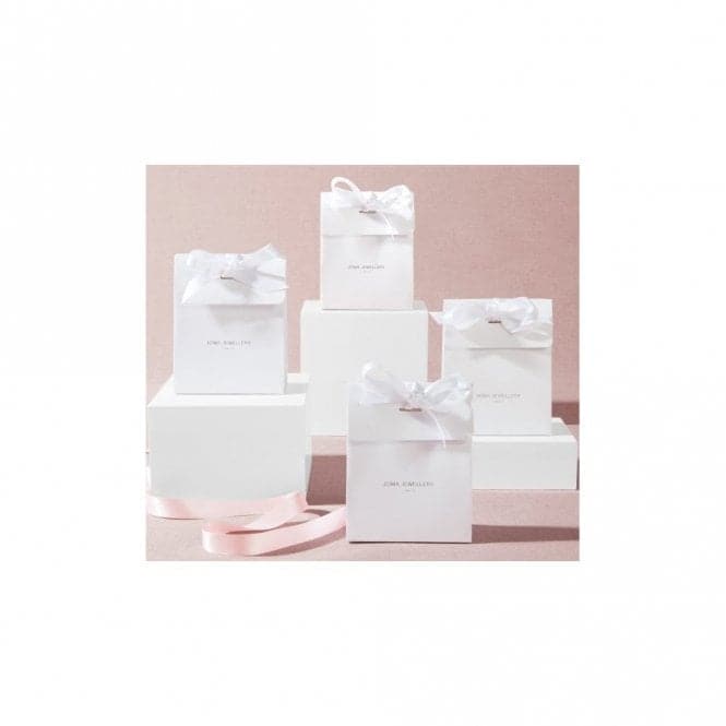 a group of white boxes with bows on them