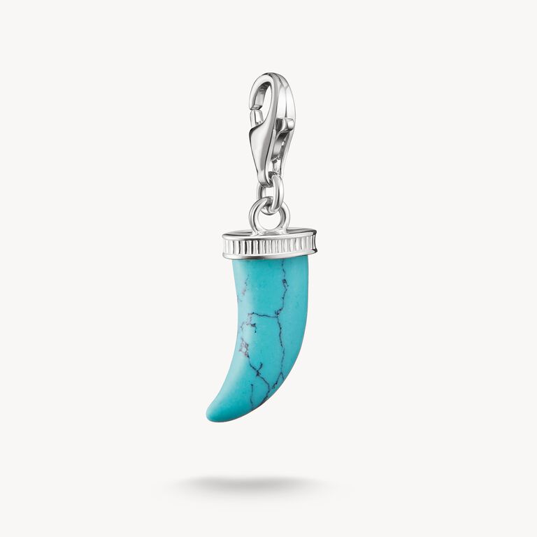 Turquoise stone pendant with silver clasp on a white background