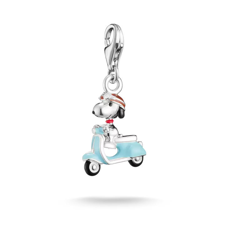Charm with a character on a scooter on a white background