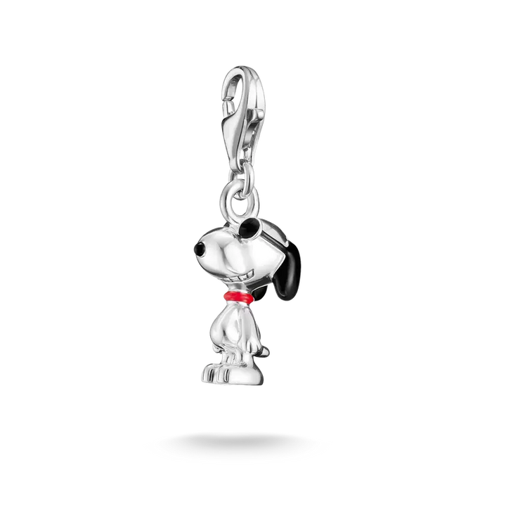 Silver dog-shaped charm with black and red accents on a white background