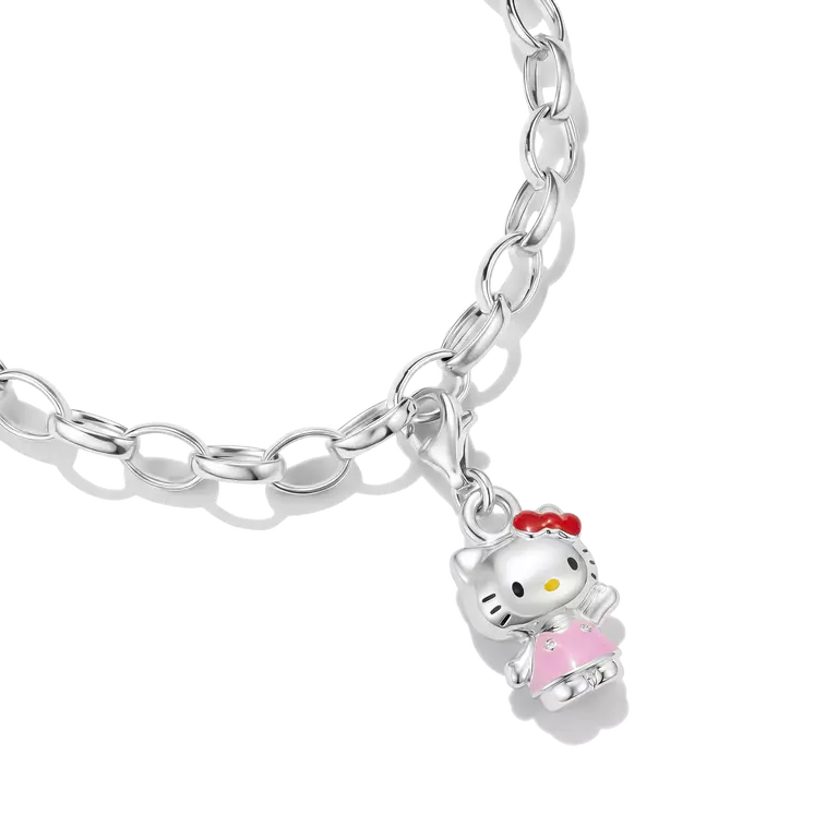 A silver link chain bracelet featuring a Hello Kitty charm wearing a pink dress and red bow, shown on a clean white background.
