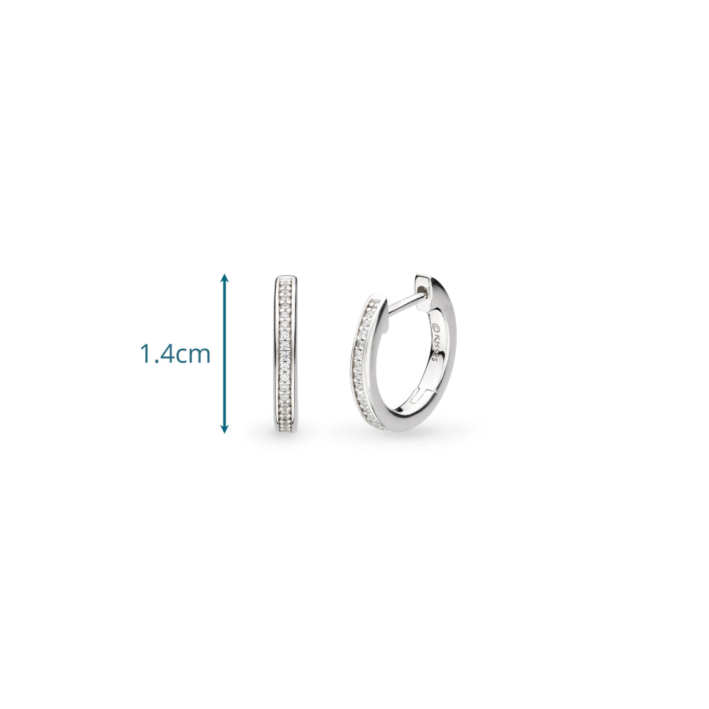 Silver hoop earrings with embedded stones on a white background