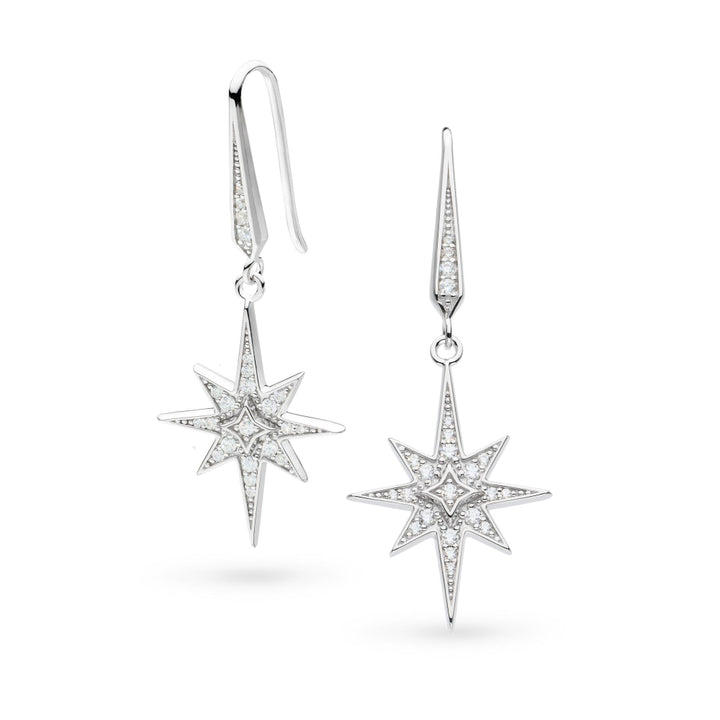 Star-shaped earrings with clear gemstones on a white background