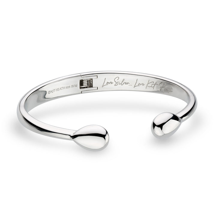 Silver bracelet with a white background