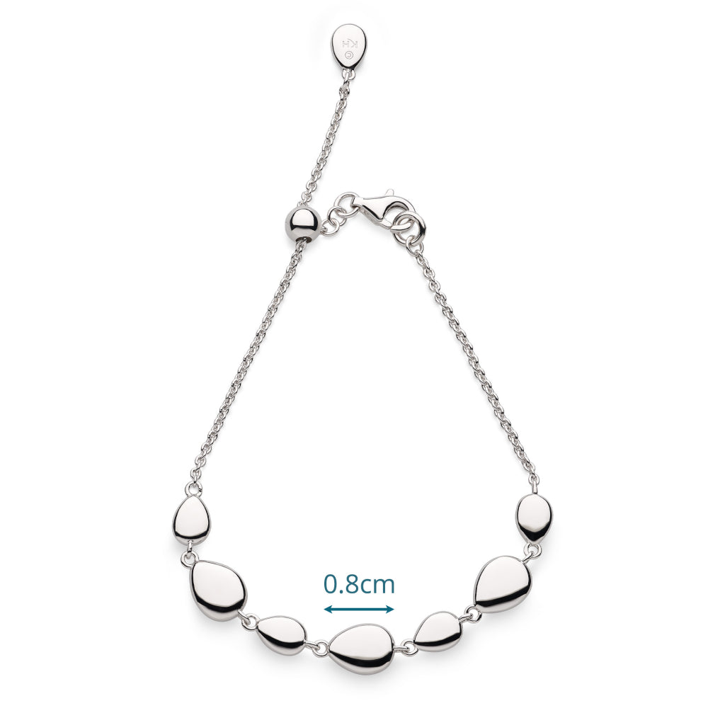 Silver bracelet with teardrop-shaped beads on a white background