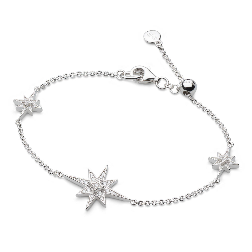 Silver bracelet with star-shaped charms on a white background