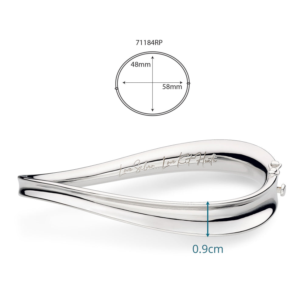 Silver teardrop-shaped object with measurements on a white background
