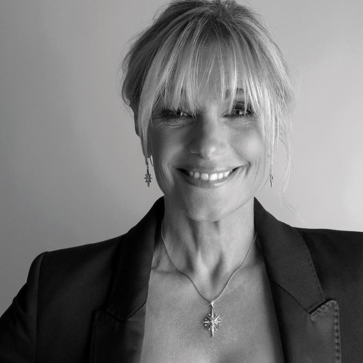 Black and white portrait of a woman with a neutral background