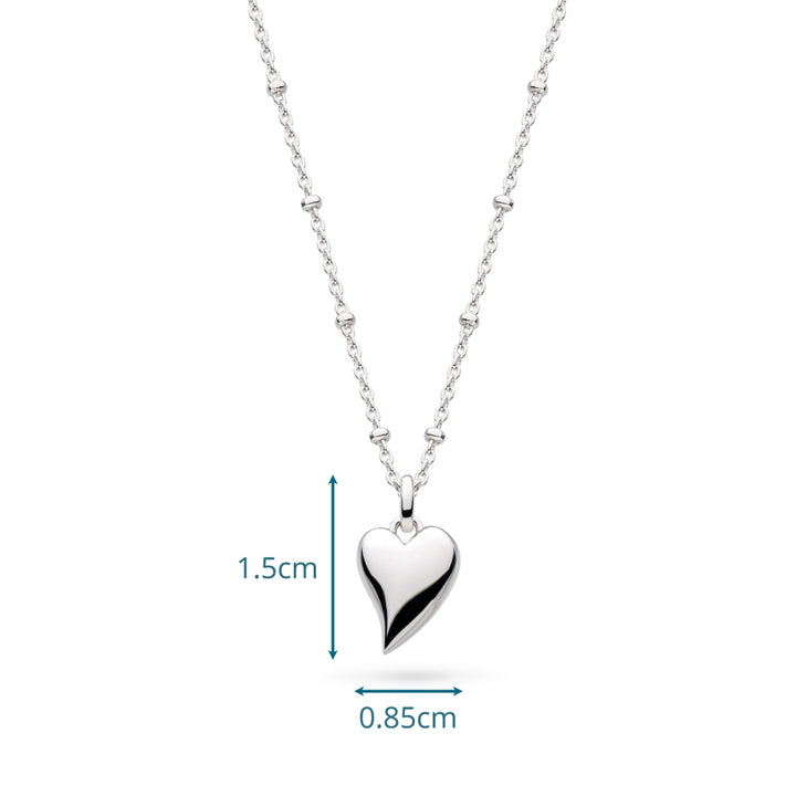 Silver heart-shaped pendant necklace with measurements on a white background