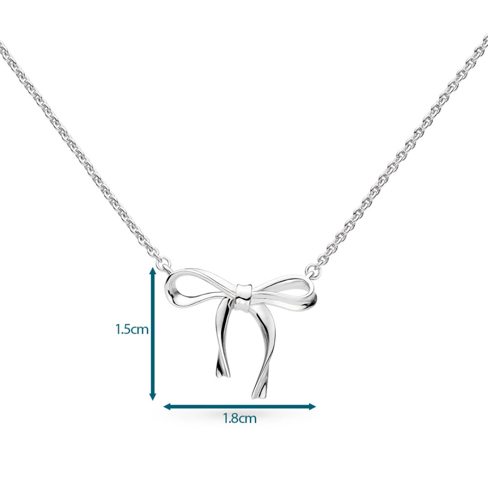 Silver bow-shaped pendant on a chain with measurements indicated.