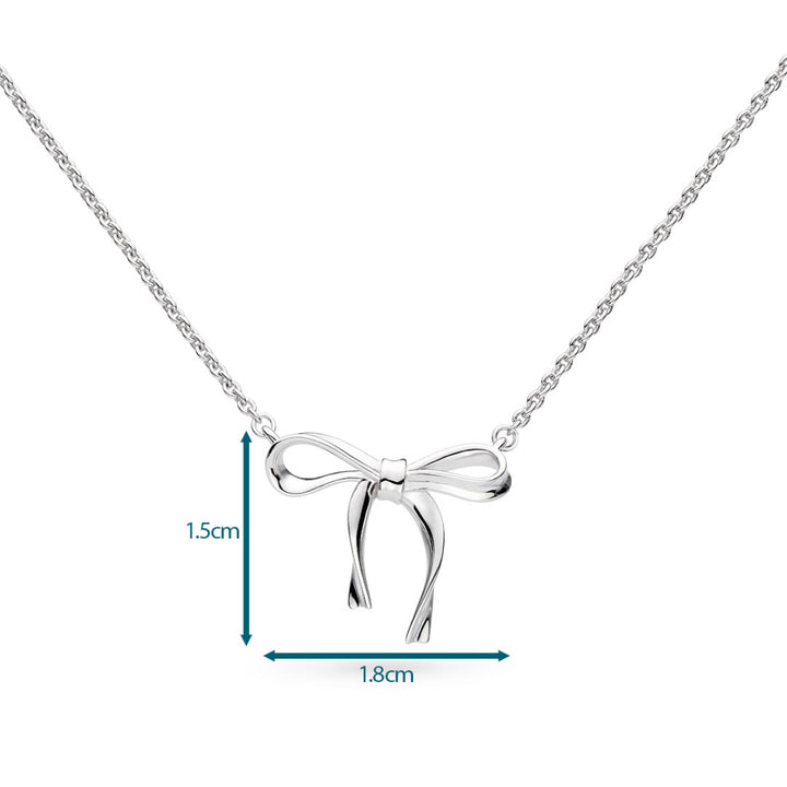 Silver bow-shaped pendant on a chain with measurements indicated.
