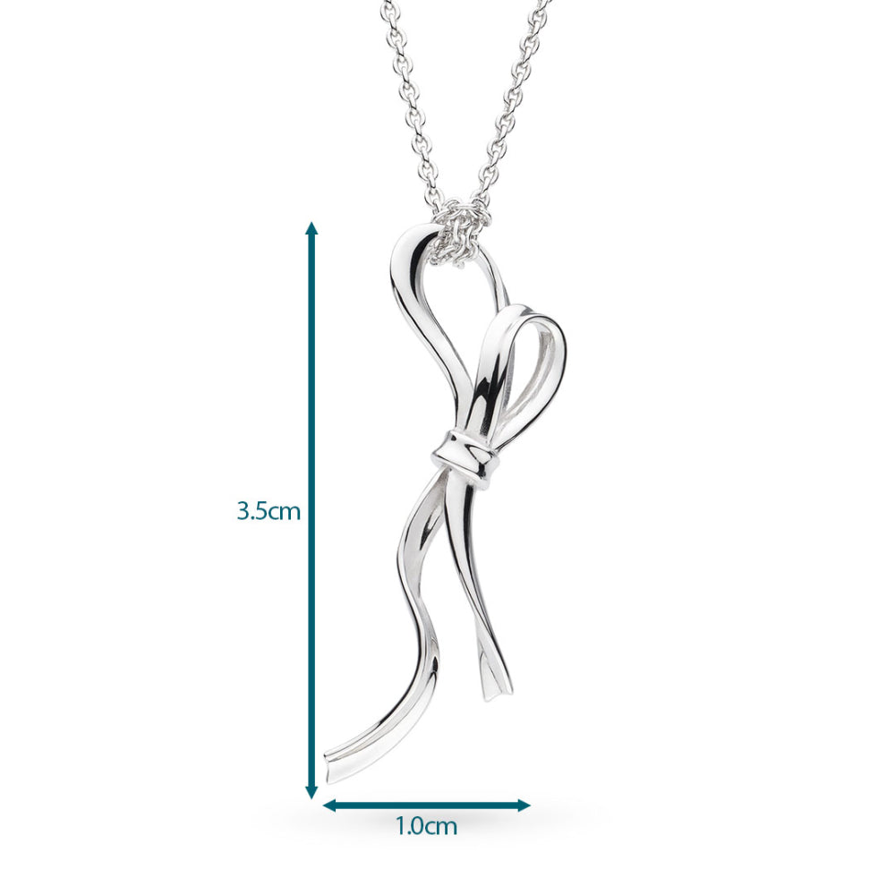 Silver bow-shaped pendant necklace with measurements on a white background