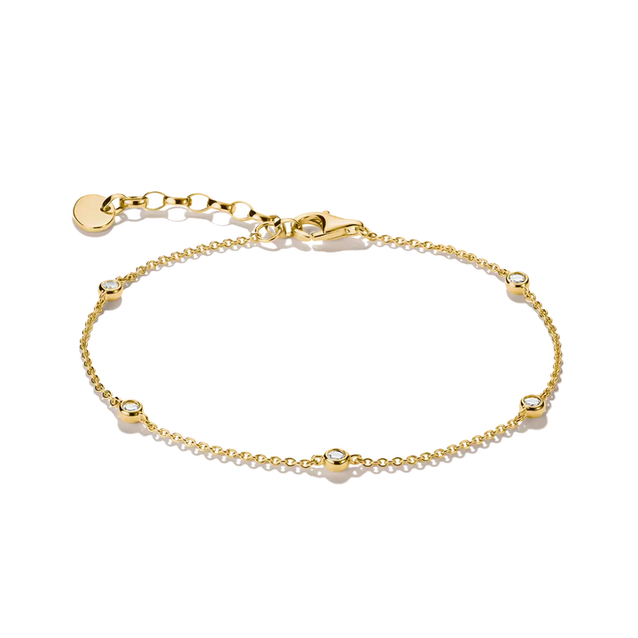 A delicate gold chain bracelet with small bead details and clear round stones, displayed on a clean white background.