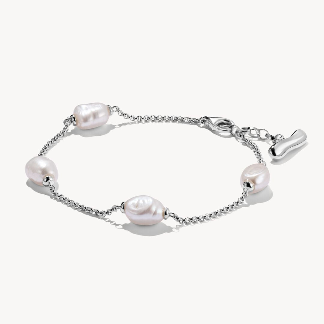 Pearl bracelet with silver chain on a white background