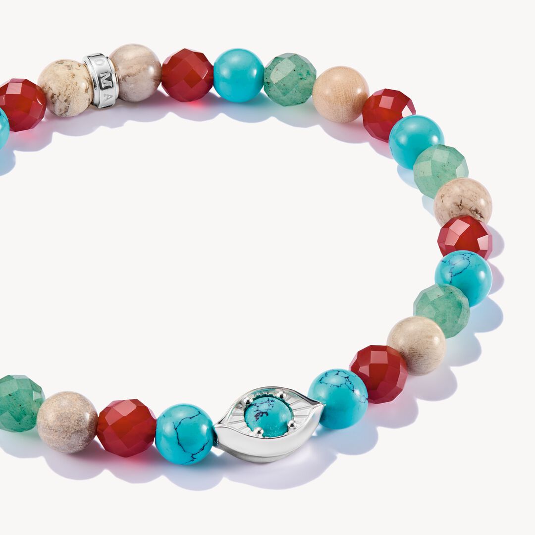 Multicolored beaded bracelet with a silver clasp on a white background